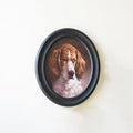 Framed Oval Dog Artwork under Glass